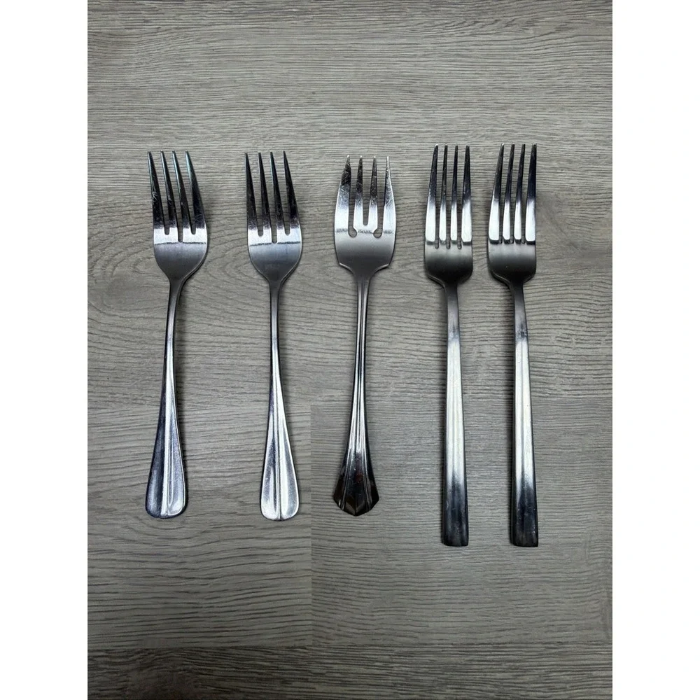 Lot Of 7 Oneida Silver (Stainless) Flatware. Two 4.5